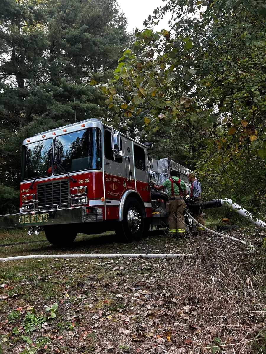 Backcountry Drafting Drill — Engine 22-22 drafting water in the woods during rural pump operator training.