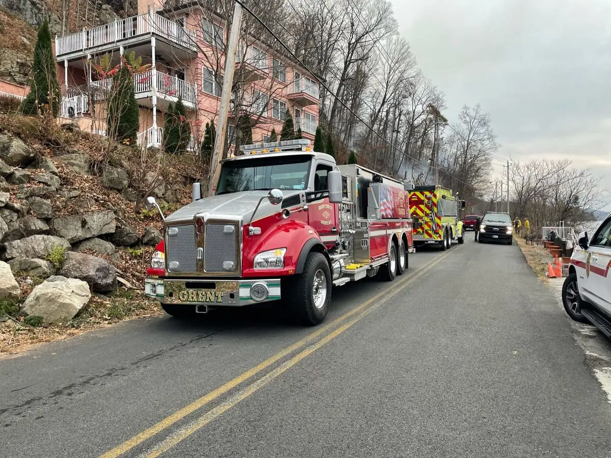 22-35 Staged on Mutual Aid — Engine-Tanker 22-35 staged on a rural Columbia County road during a daytime mutual-aid call.