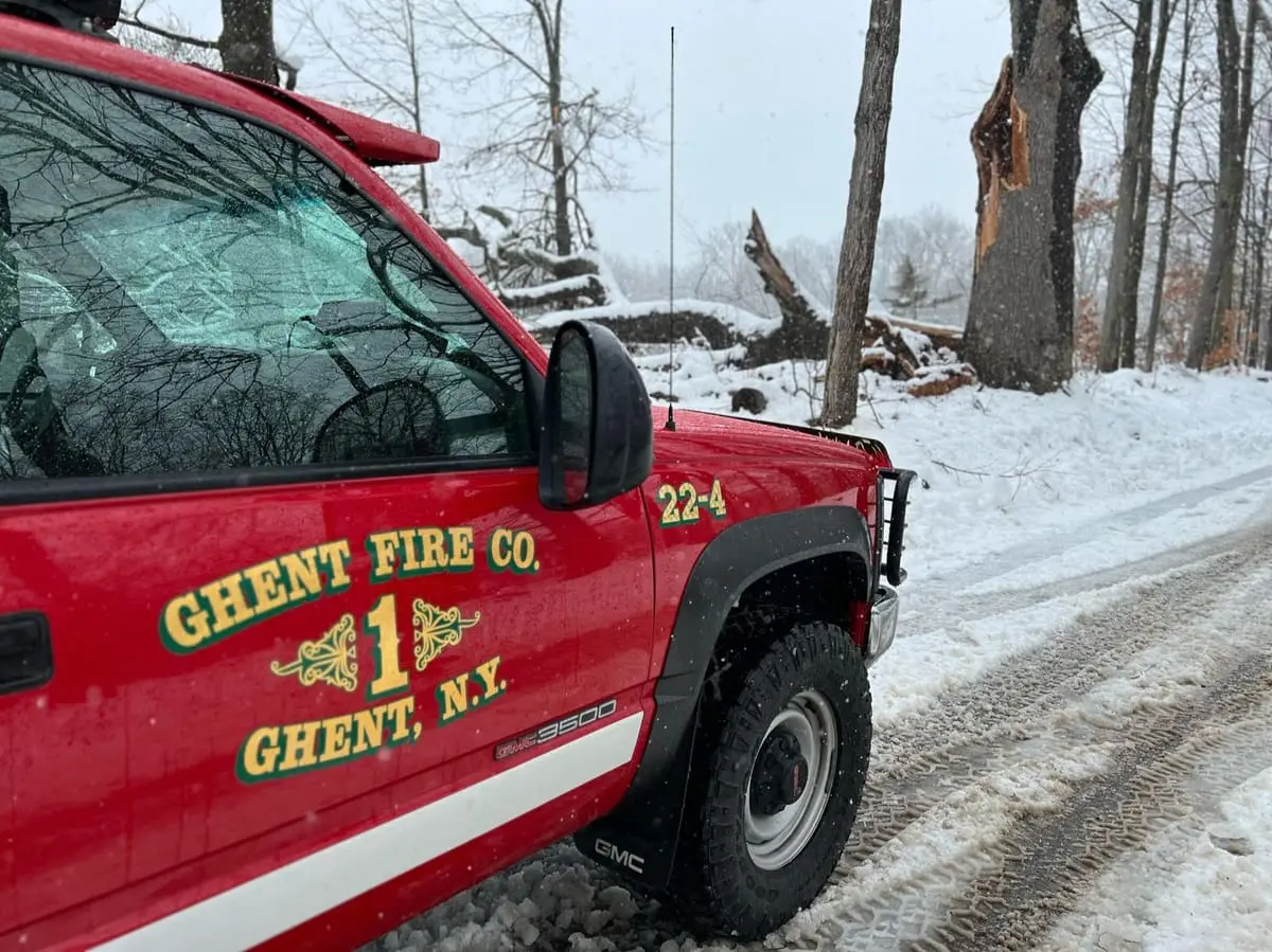 Brush 22-69 Winter Response — Brush 22-69 staged on a snow-covered Ghent road during winter storm operations.