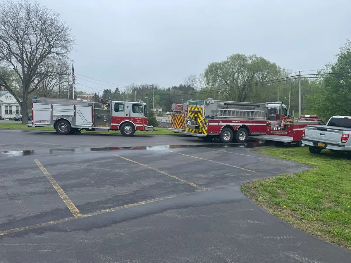 Apparatus Bays & Fleet Array — Engines 22-22, 22-43, and Tanker 22-35 staged in front of the Route 66 apparatus bays.